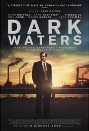 Poster: Mark Ruffalo in a suit in front of an industrial sunset